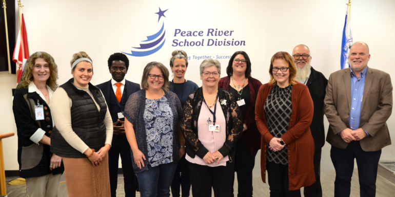 A picture of the Peace River School Division Board of Trustees including Acting Deputy Superintendent Aleeta Ploc, Trustee Edith Giesbrecht, Trustee Moïse Dion, Trustee Lori Leitch, Trustee and Vice Chair Lacey Buchinski, Trustee Marie Dyck, Trustee and B
