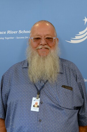 a photo of David, a man, happy, wearing glasses, no hair, long white beard